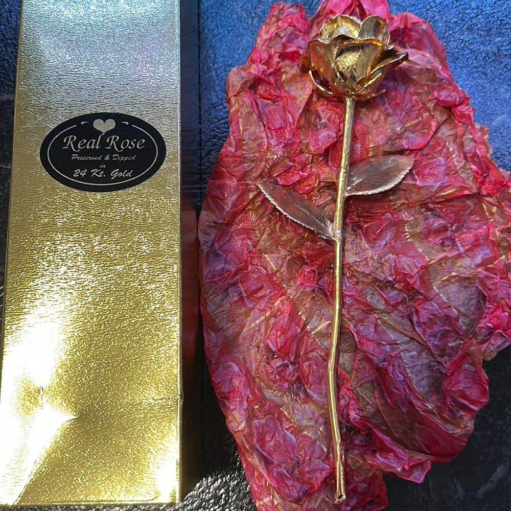 Valentine real rose preserved in 24kt gold Michael Gallagher jewelers